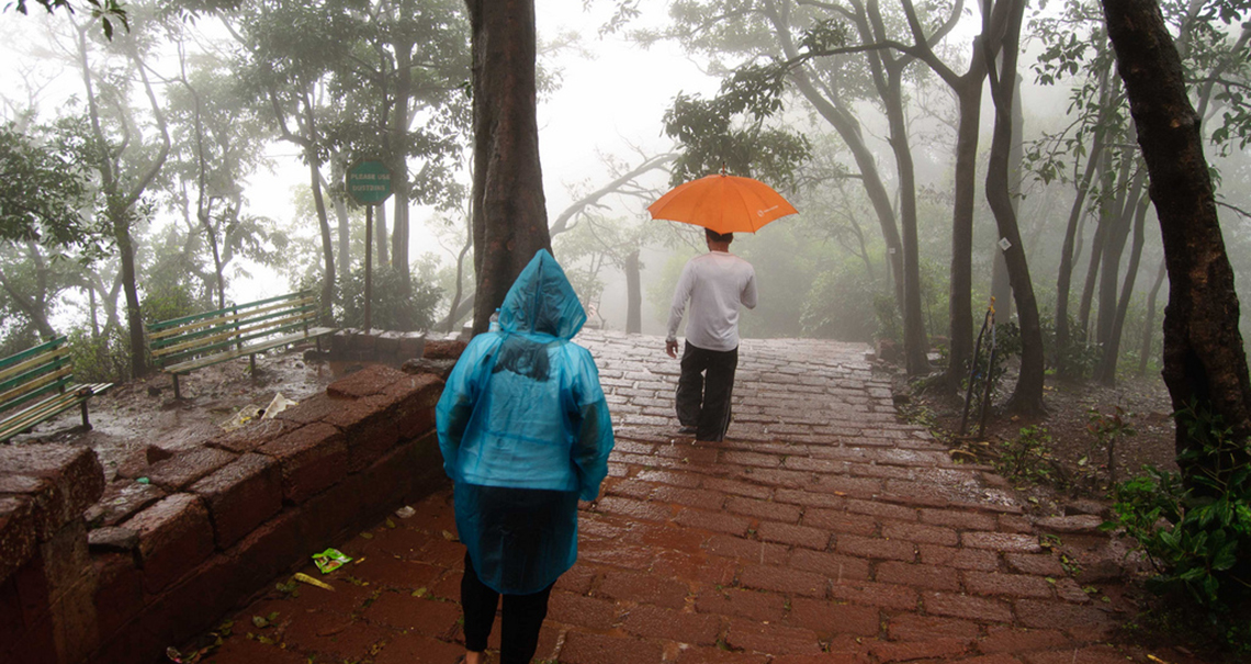 Image Name - Monsoon Travel Tips - Carrying Umbrella and Raincoat