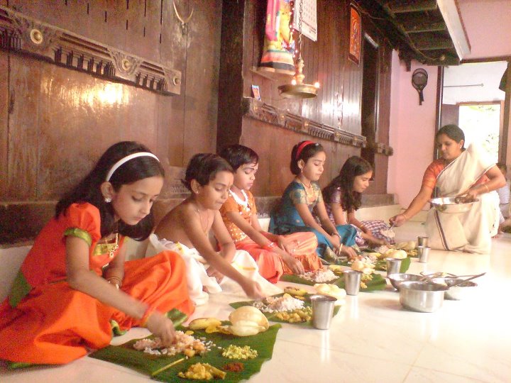 People eating sadhya