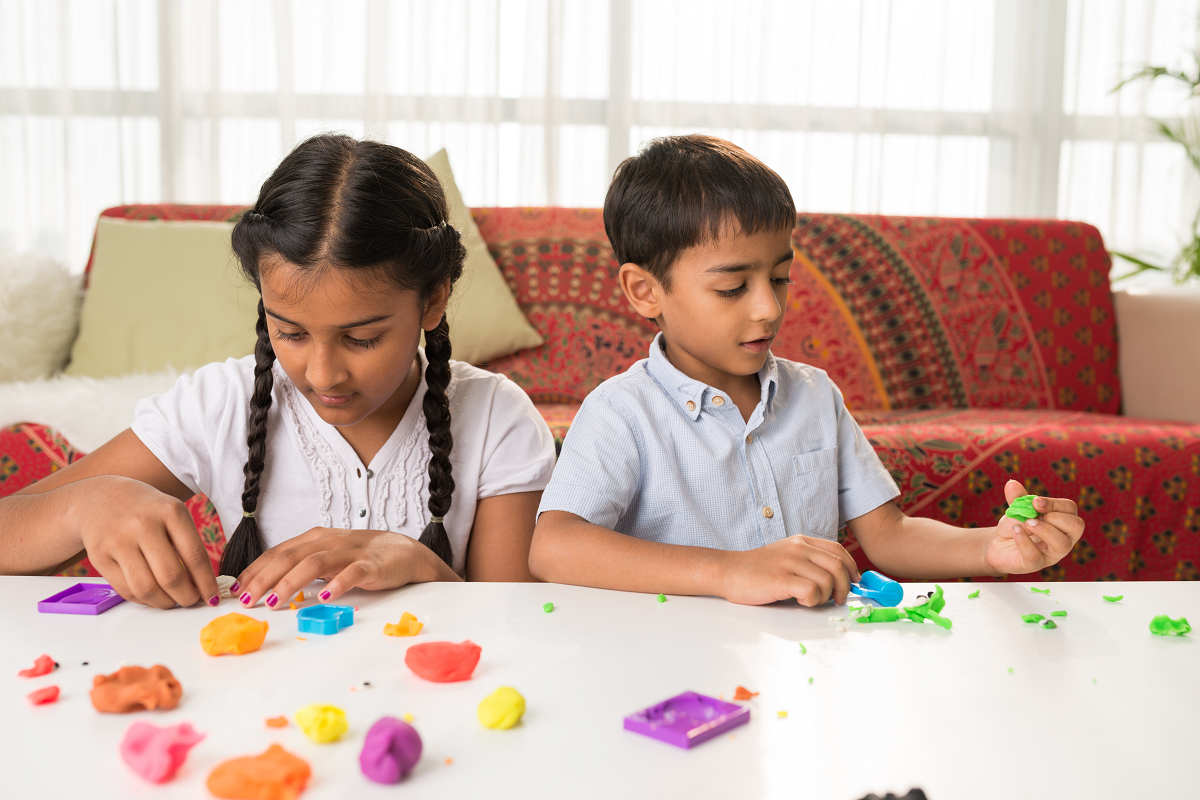 Indian Siblings playing